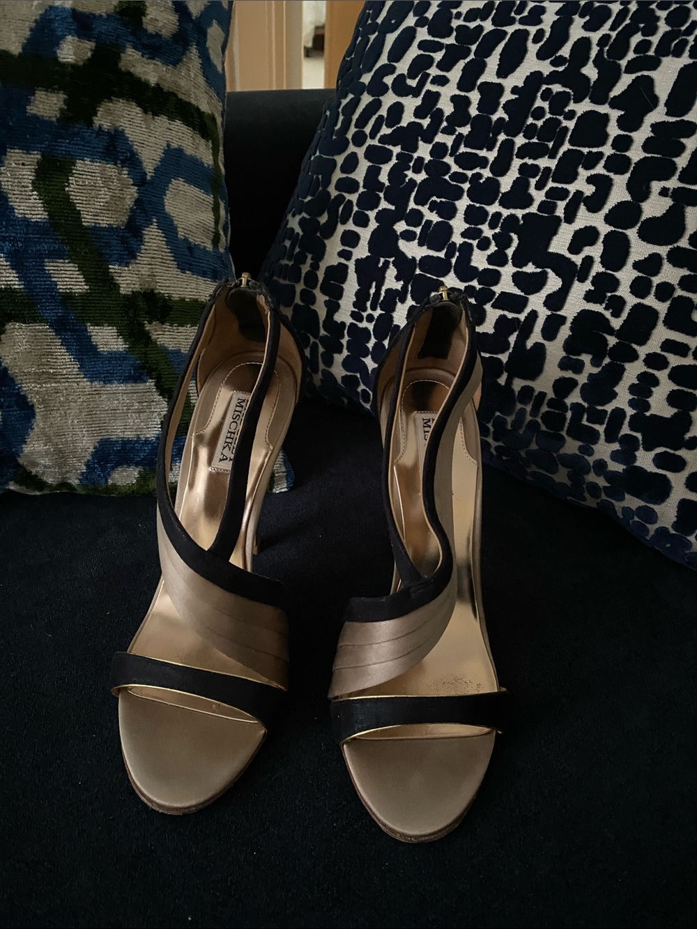 Badgley Mischka taupe and black satin 5“heels trimmed in a little gold .